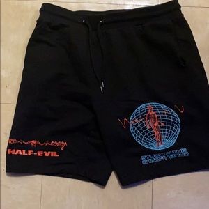 Half evil “stuck in this cruel world” sweat shorts